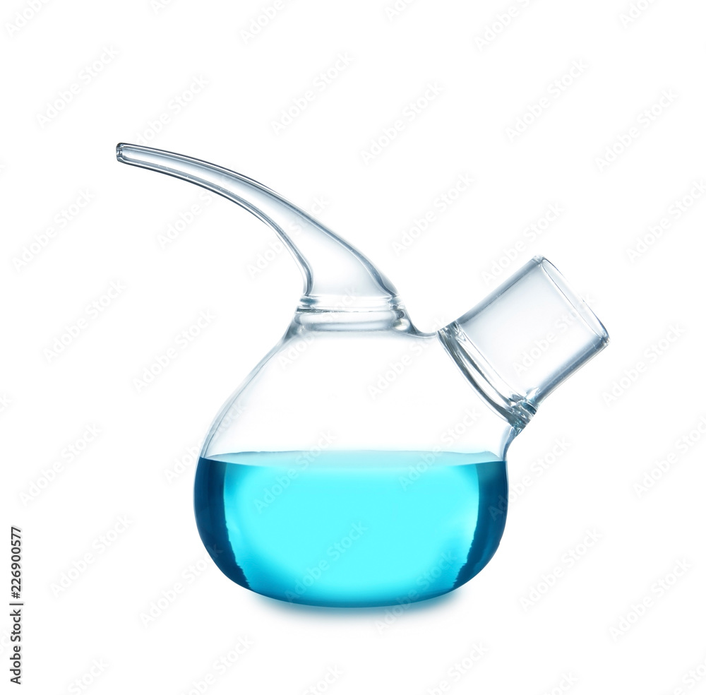 Retort flask with blue liquid on table against white background. Laboratory analysis Retort flask with blue liquid on table against white background. Laboratory analysis