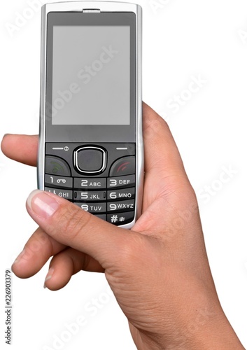 Wallpaper Mural Holding a keyboard based smart phone Torontodigital.ca