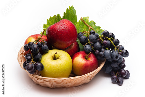 Obraz na plátně fresh fruit basket on white background