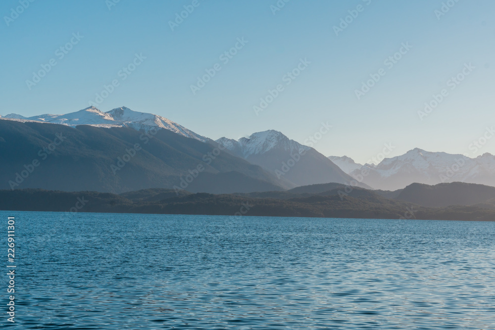Beautiful of mountain and lake in sun light Beautiful of mountain and lake in sun light