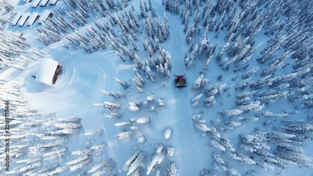 Snowplow on British Columbia slopes, overhead aerial