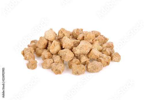 pile of textured soy protein on white background