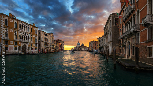 Grand Canal at sunrise in Venice  Italy. Sunrise view of Venice Grand Canal. Architecture and landmarks of Venice. Venice postcard