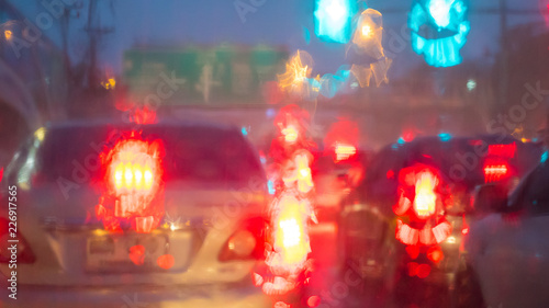 Rain and traffic jams blur background © boyhey