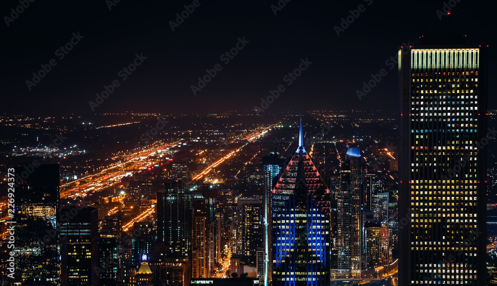 Chicago cityscape skyscrapers at night aerial view