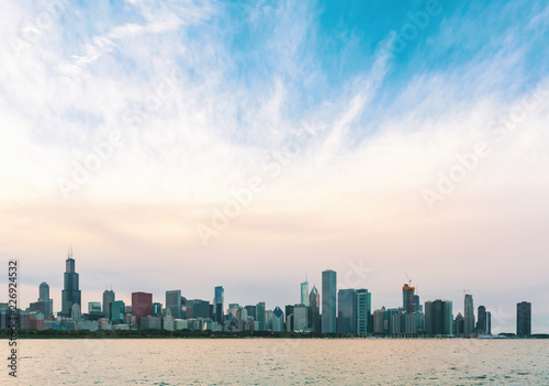 Downtown Chicago cityscape skyline at twilight with Lake Michigan in the foreground