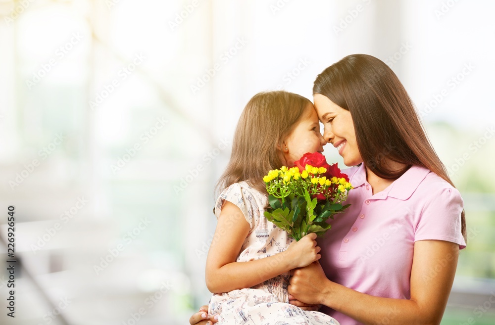 Happy Mother and daughter hugging Happy Mother and daughter hugging