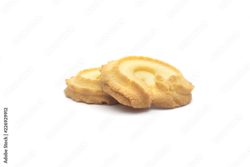 one side of two butter cookies on white background one side of two butter cookies on white background
