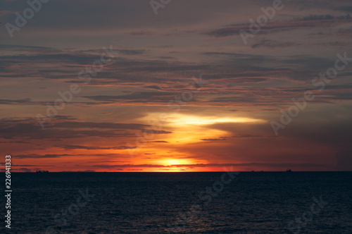 Beautiful red sunset over the ocean © Tushchakorn