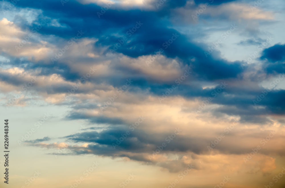 Blue sky with clouds and sunlight