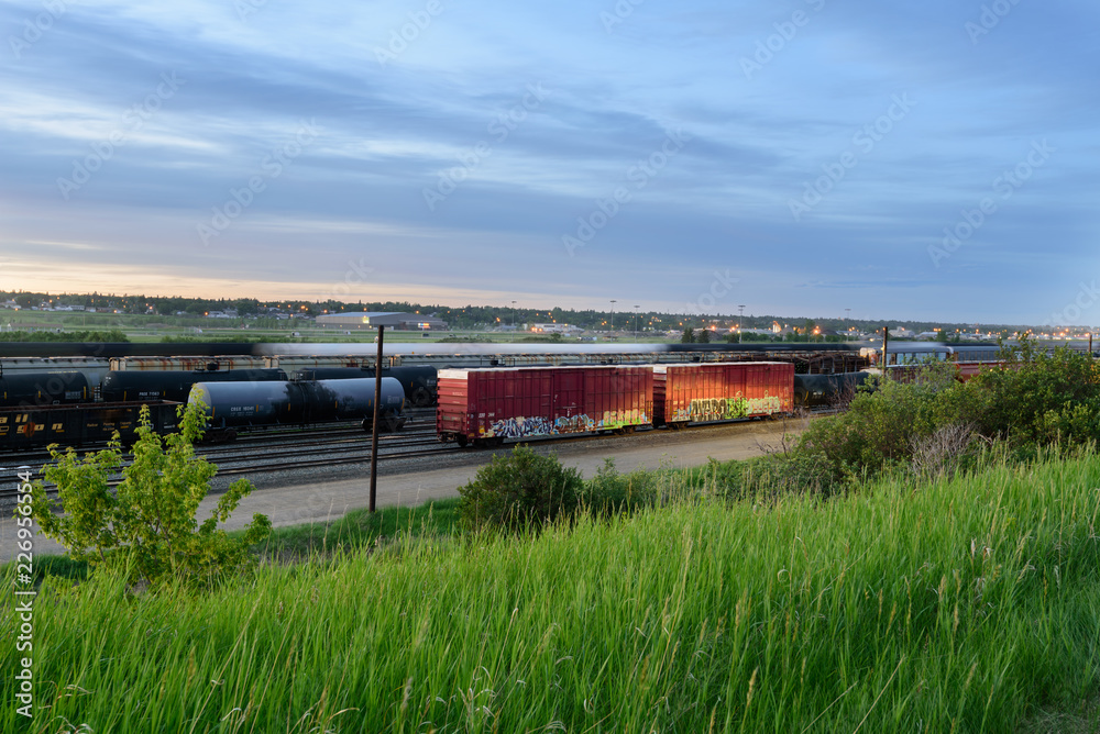 freight train on the railway at dusk
