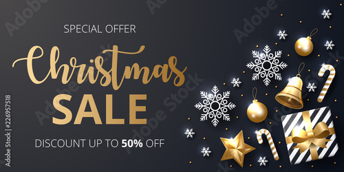 Christmas sale banner with shining gold and white ornaments.