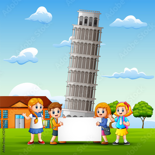 Cartoon kids bring a whiteboard in front of pisa tower background