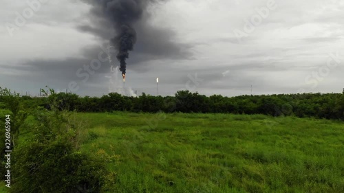 Chemical Plant Conducting Controlled Flaring to Burn Off Excess Materials in Channelview near Houston, Texas Filmed by Drone photo