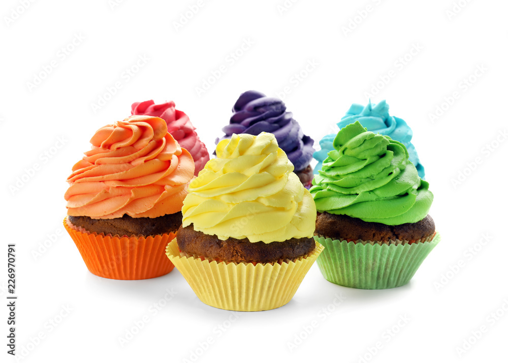 Delicious colorful cupcakes on white background Delicious colorful cupcakes on white background