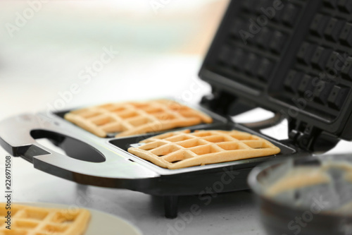 Cooking of Belgian waffles