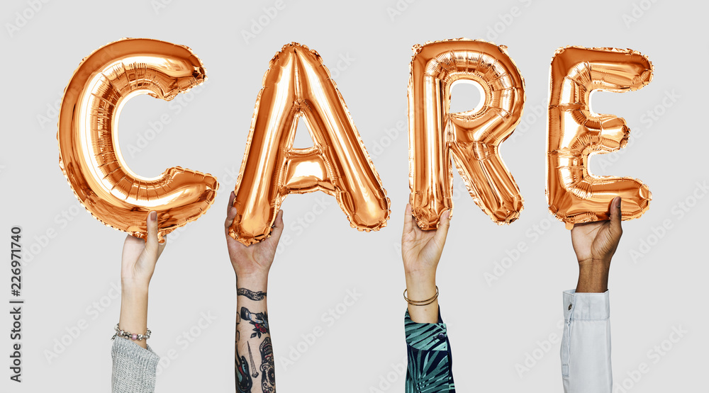 Hands showing care balloons word