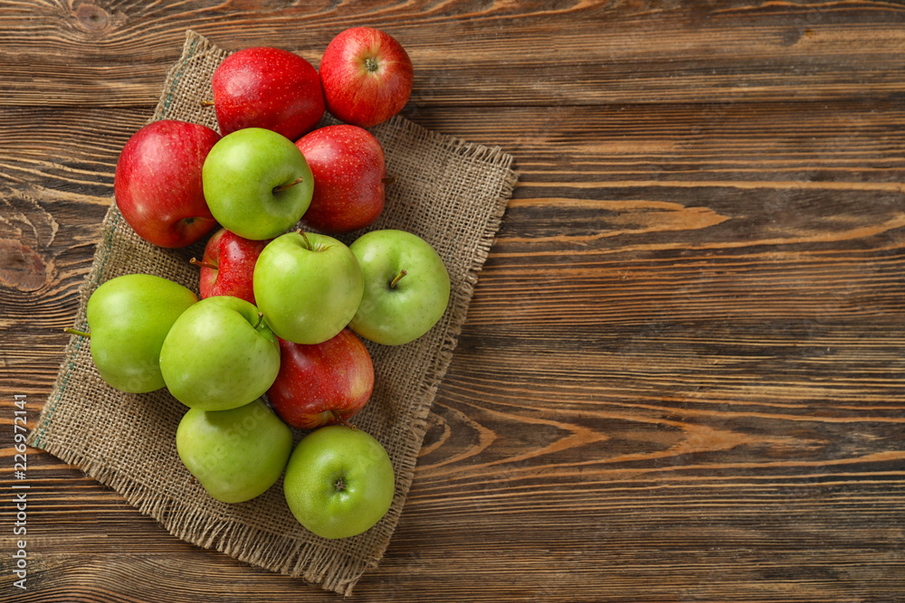 Fresh ripe apples on wooden table Fresh ripe apples on wooden table