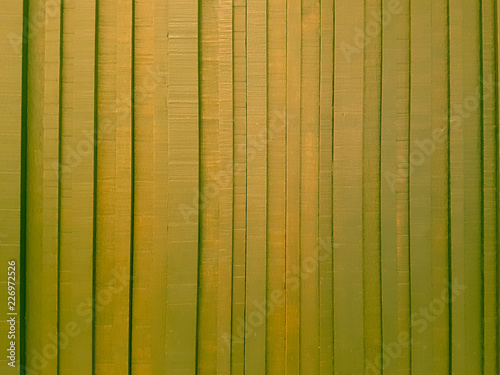 Yellow wooden wall background.
