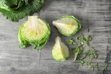Cut savoy cabbage on grey table