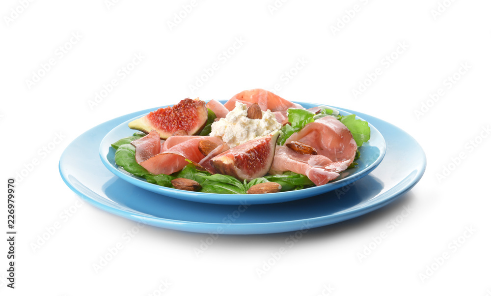 Plates with delicious fig salad on white background