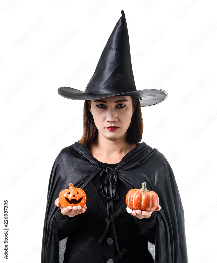 Portrait of woman in black Scary witch halloween costume standing with hat isolated on white background Portrait of woman in black Scary witch halloween costume standing with hat isolated on white background