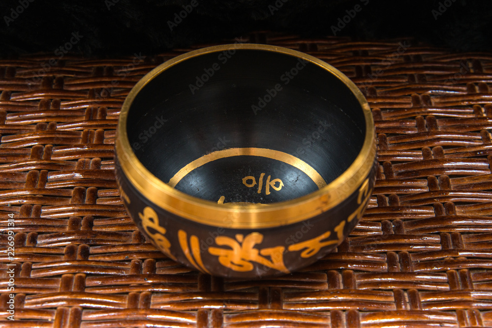 Naklejka premium Tibetan handcrafted singing bowls. Tibetan sound massage.