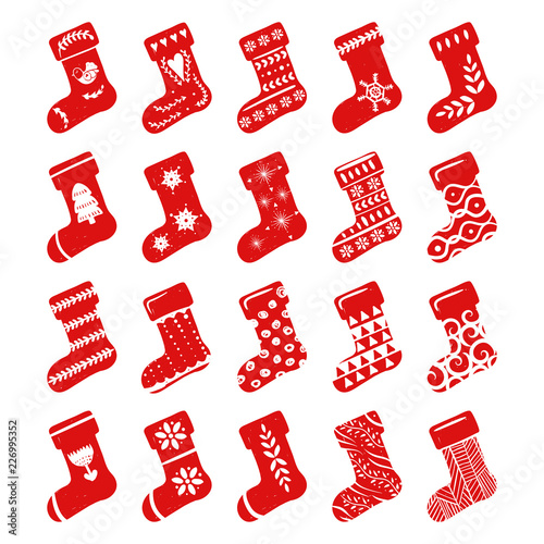 Red simple Christmas stockings for holiday celebrations Scandinavian Nordic style. Christmas, new year decor. Collection of Christmas sock with simple decoration hand drawn