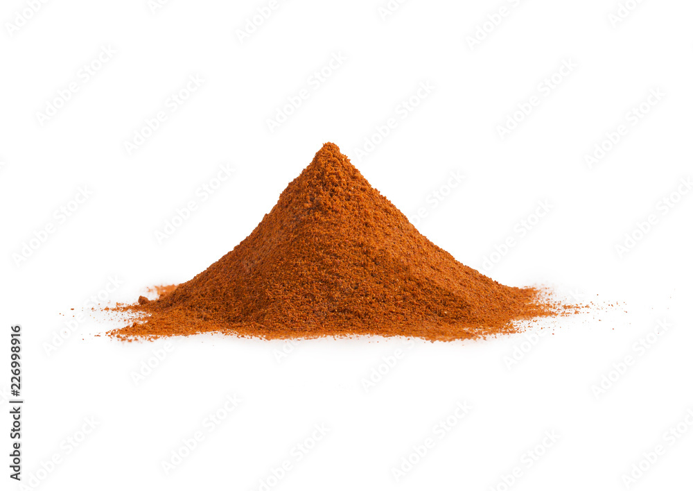 Pile of red ground paprika isolated on white Pile of red ground paprika isolated on white