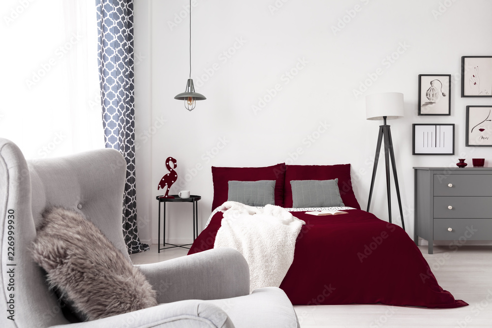 Burgundy and store gray bedroom