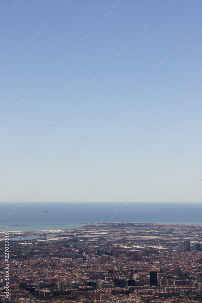 View on Barcelona city and mediterranean sea from Tibidabo hill