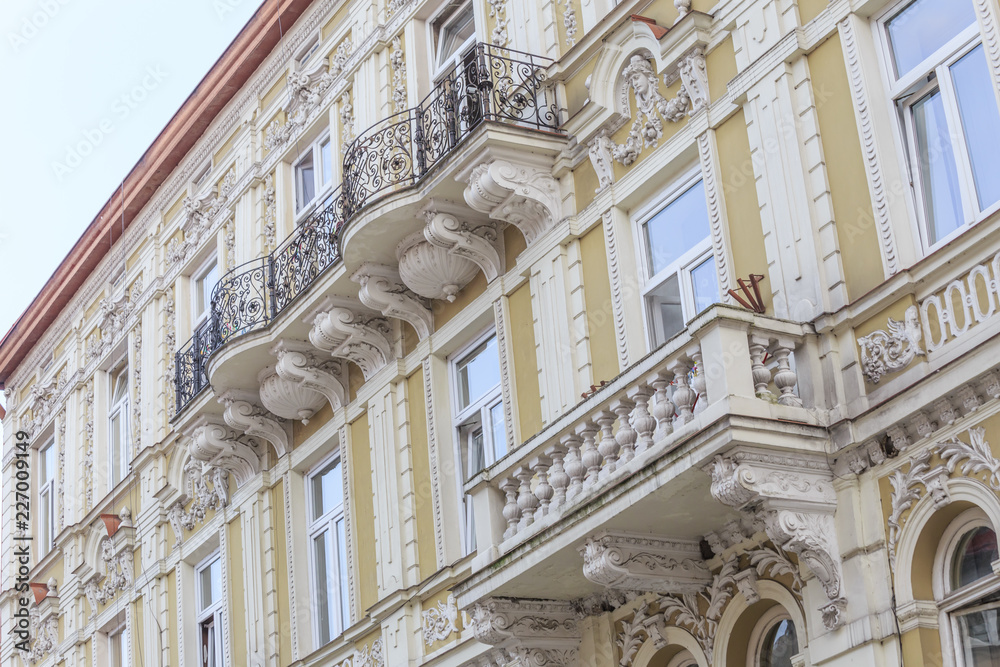 Fragments of facade of an Art Nouveau tenement house located on eastern frontage of Old Market Square in Przemysl, Poland 