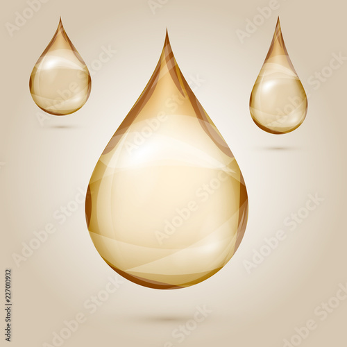 Shine yellow oil drops isolated vector illustration. Golden cosmetic drop