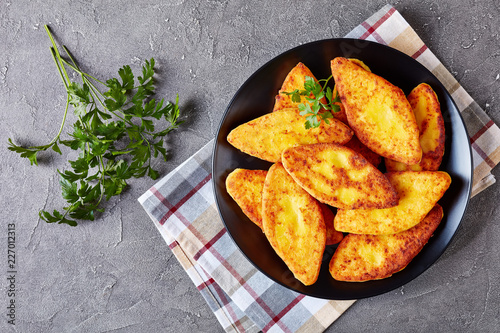 fried cornbread pancakes on a plate photo