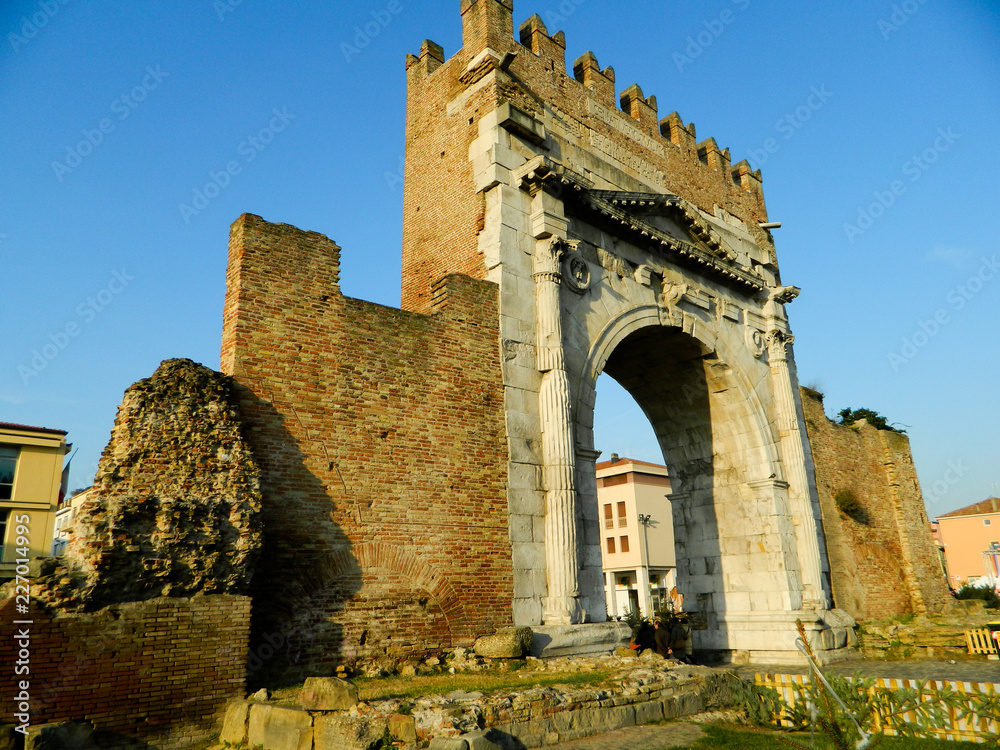 Augustus arch in Rimini - ancient romanesque gate of the city - historical landmark of Italy, The historic and famous Arch of Augustus.