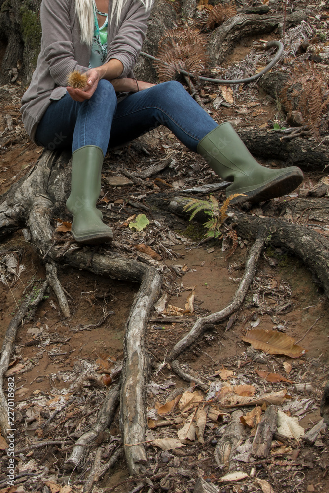 Crop view of young adult woman sitting 