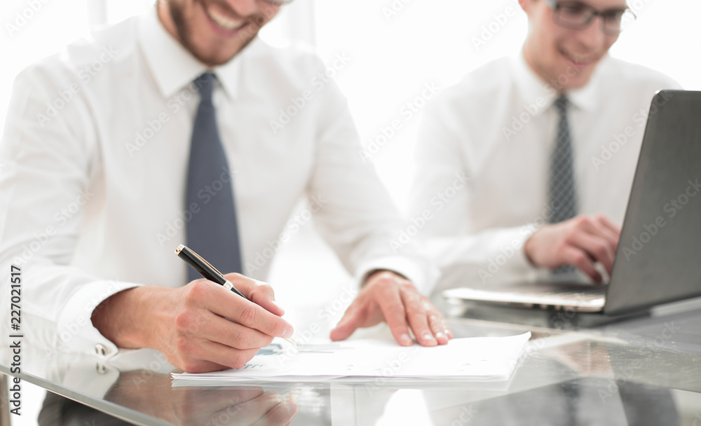 close up.businessman checking financial report close up.businessman checking financial report