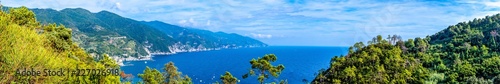Panoramic view of mountains and ocean bay in Monterosso Al Mare village Italy © Guy