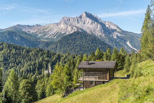 Wooden house in the mountains, italian dolomites, Sauris