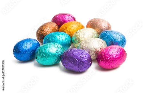 chocolate eggs in color foil isolated