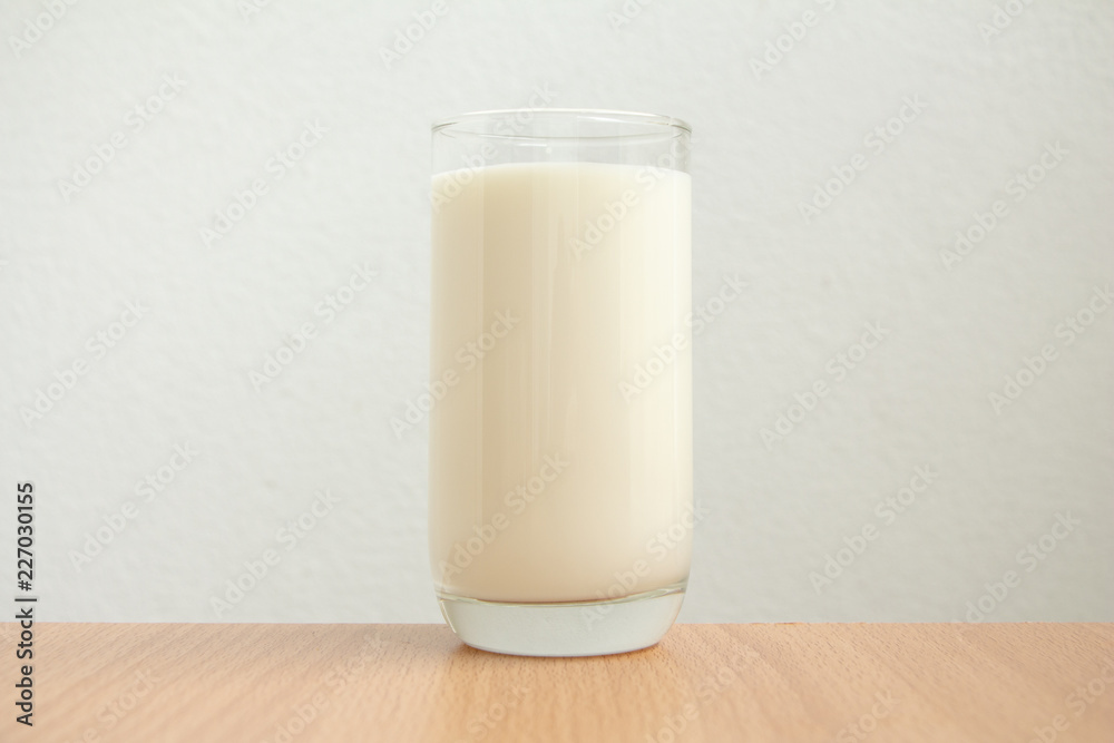 close up milk in glass on withe background. close up milk in glass on withe background.