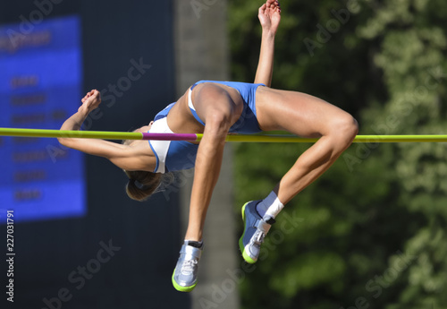 young woman in highjump,track and field photo