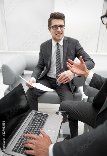 close up.business partners discussing financial data.business concept © ASDF