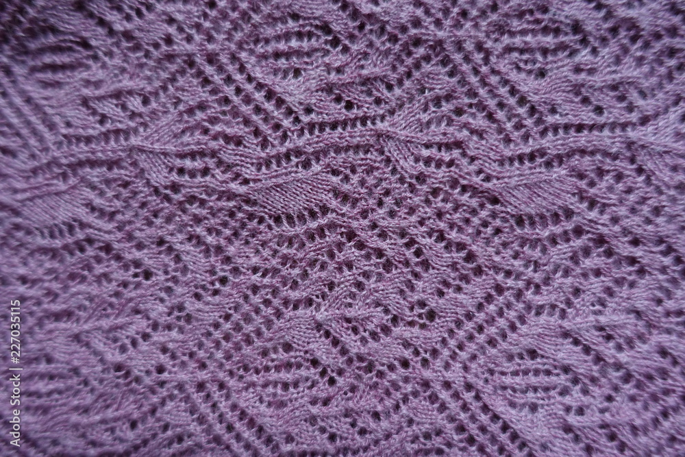 Thin pink handmade knitted lace from above Thin pink handmade knitted lace from above