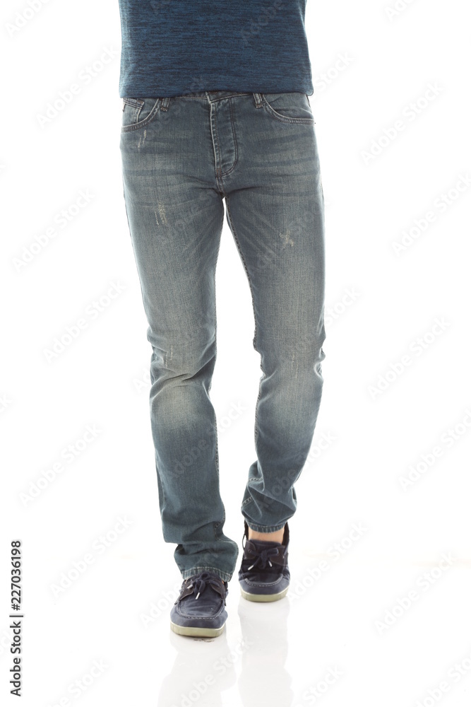 man legs and blue denim on white background man legs and blue denim on white background