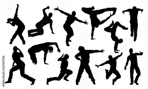 A set of men and women street dance hip hop dancers in silhouette