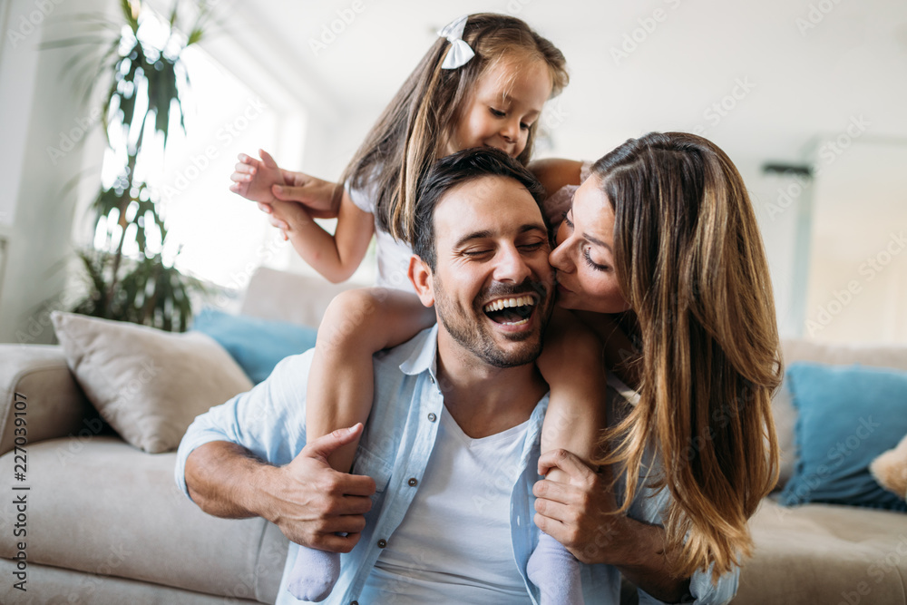 © NDABCREATIVITY - Happy family having fun time at home