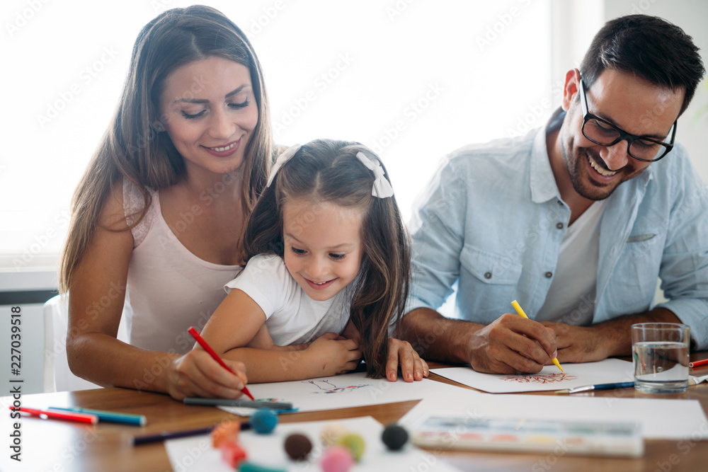 Happy family having fun time at home Happy family having fun time at home
