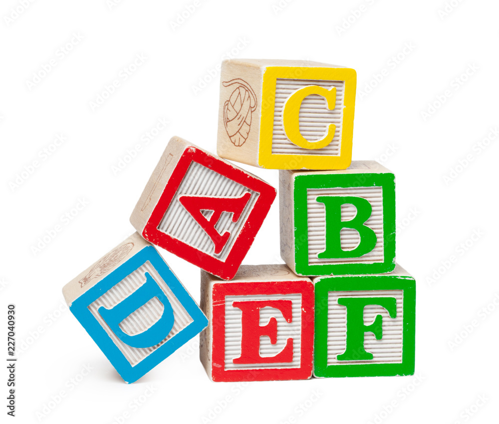 Wooden alphabet blocks isolated on white background Wooden alphabet blocks isolated on white background
