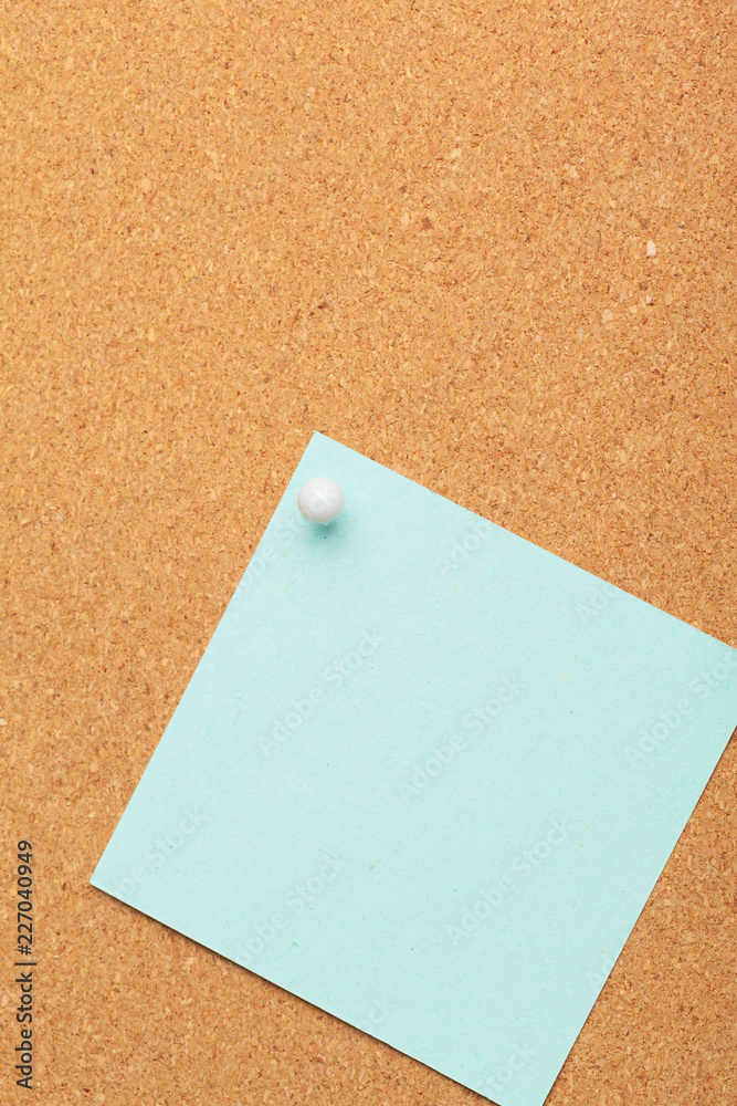 Sticky notes with pushpins and blank space on cork background. School or business concept Sticky notes with pushpins and blank space on cork background. School or business concept